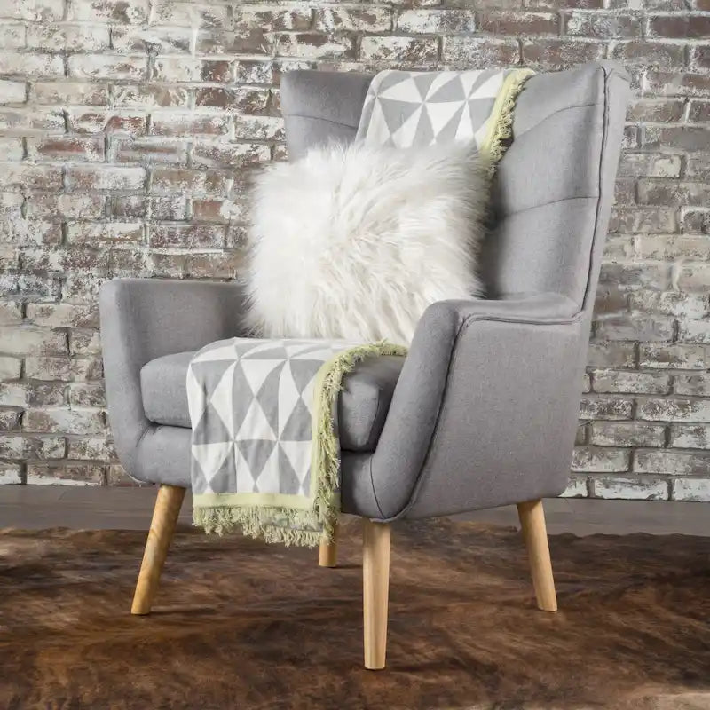 Moderna Poltrona a Orecchioni con Schienale Alto 32.5, Rivestita e Capitonnè, con Gambe in Legno di Caucciù