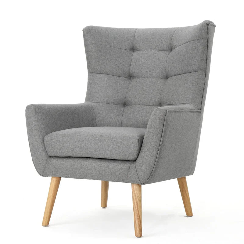 Moderna Poltrona a Orecchioni con Schienale Alto 32.5, Rivestita e Capitonnè, con Gambe in Legno di Caucciù