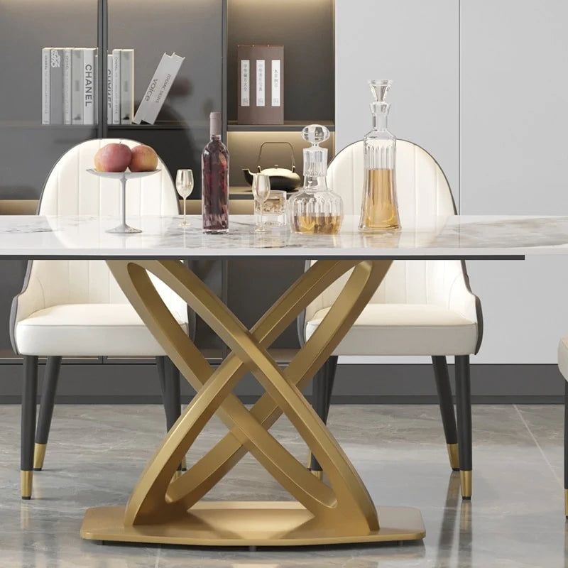 Tavolo da pranzo moderno con piano rettangolare in pietra sinterizzata e base dorata
