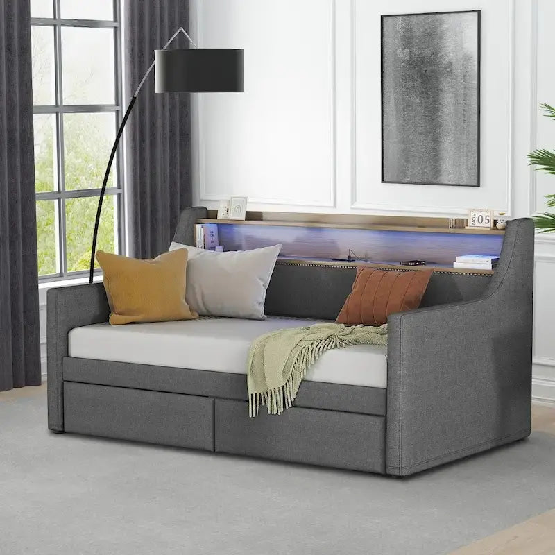 Moderno ed elegante divano letto singolo imbottito con contenitore e finiture borchiate